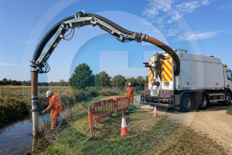 Industrial workers using the Goliath Heavy Duty Suction Excavator Hose from Century Hose